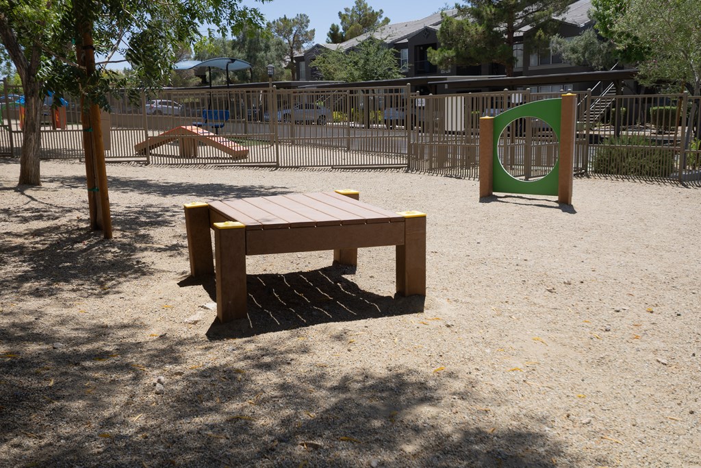 Pet park with agility equipment.