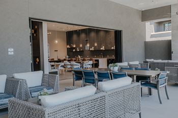 Indoor/outdoor patio to clubhouse with lots of seating at Level 25 at The Curve by Picerne, Las Vegas, NV, Nevada