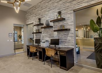 Resident business center with two computer work stations and printer at Level 25 at The Curve by Picerne, Las Vegas, NV