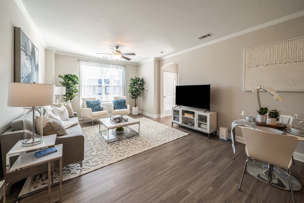 a living room with a couch and a tv