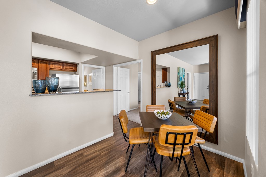 A dining room with a table and chairs. at The Equestrian by Picerne Apartments, Nevada, 89052