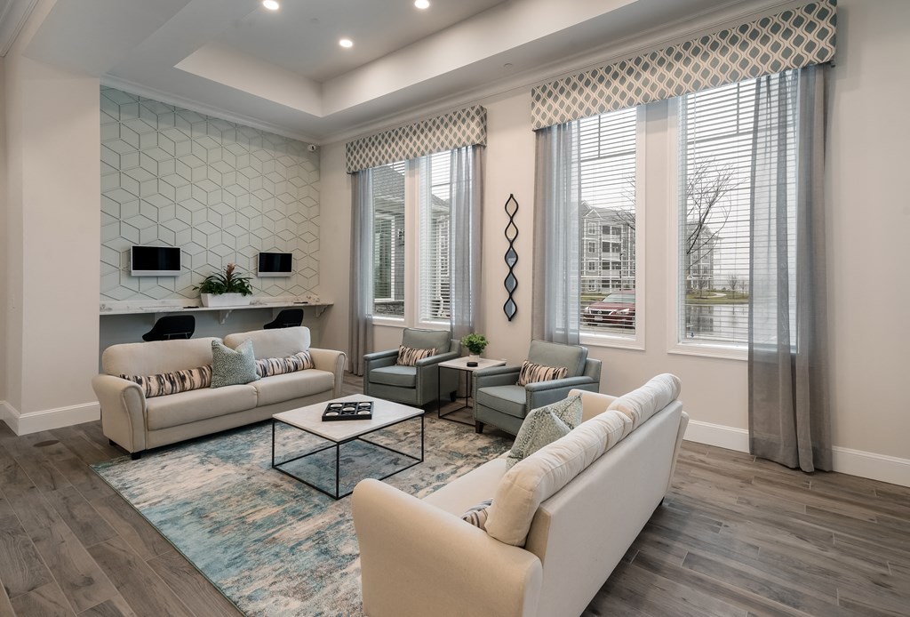 a living room with couches and a coffee table