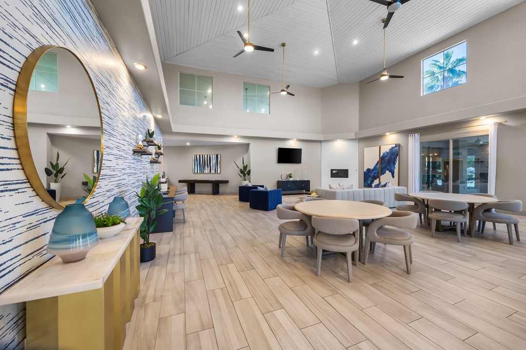 Open area clubhouse with seating at The Equestrian by Picerne Apartments, Henderson 89052