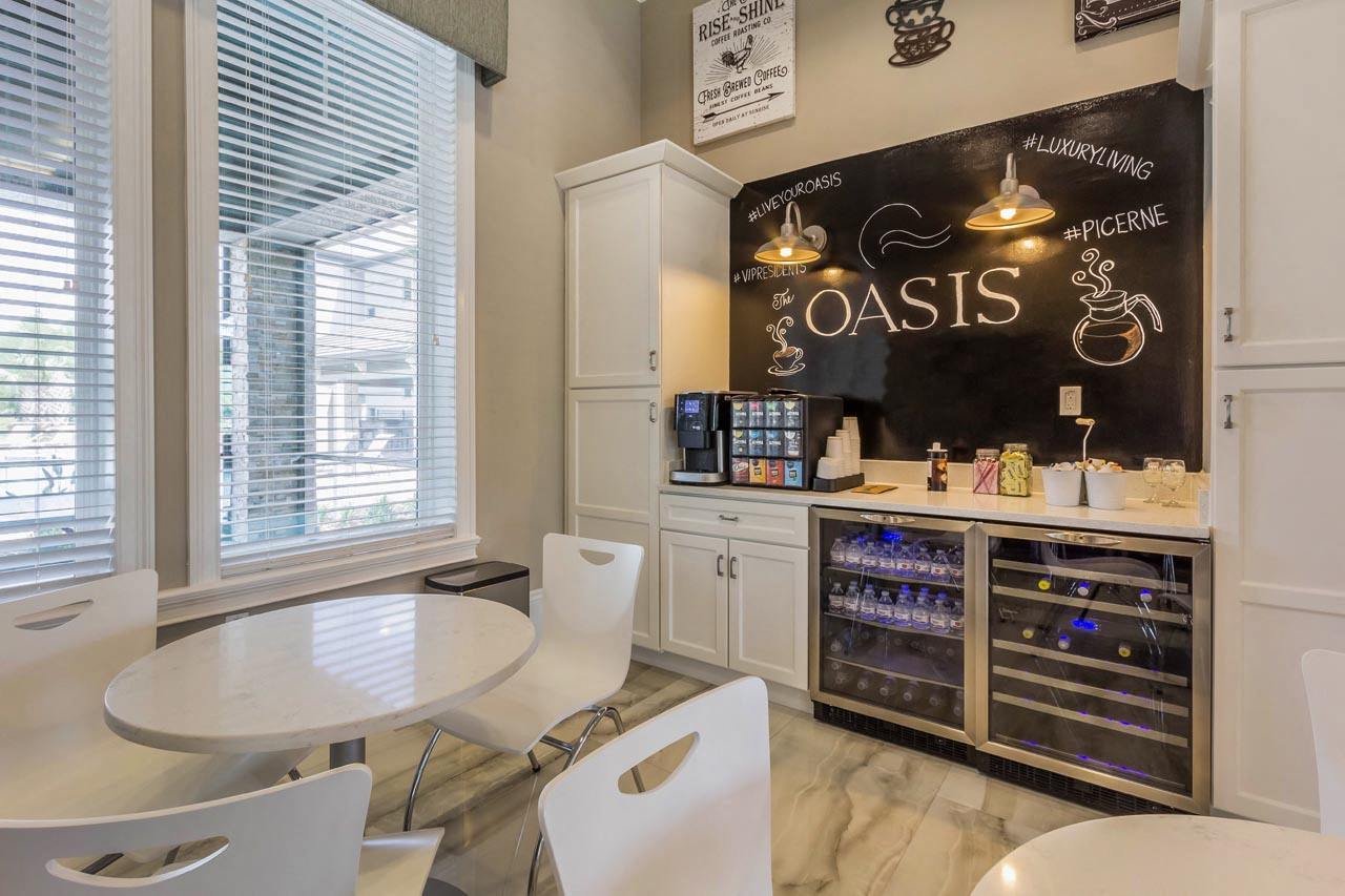 Clubhouse interior with dining at The Oasis at Crosstown, Orlando