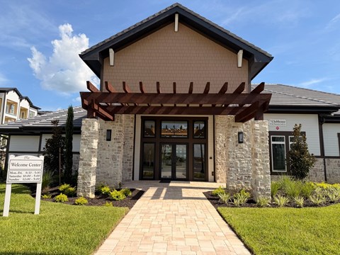 A building with a sign that says Welcome Center.