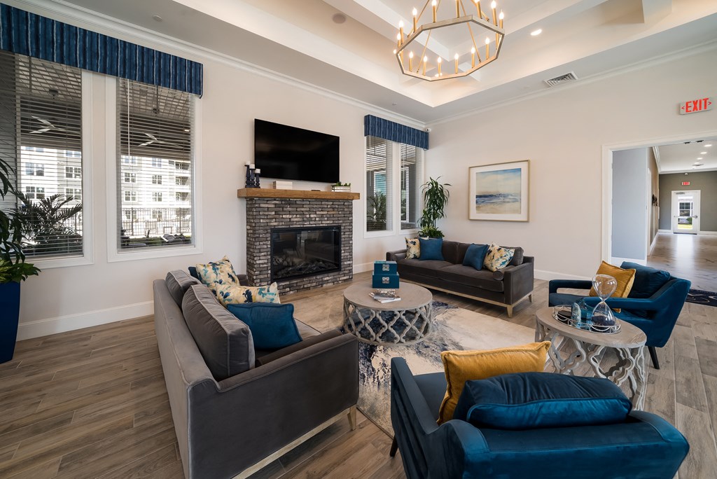 a living room with couches and a fireplace