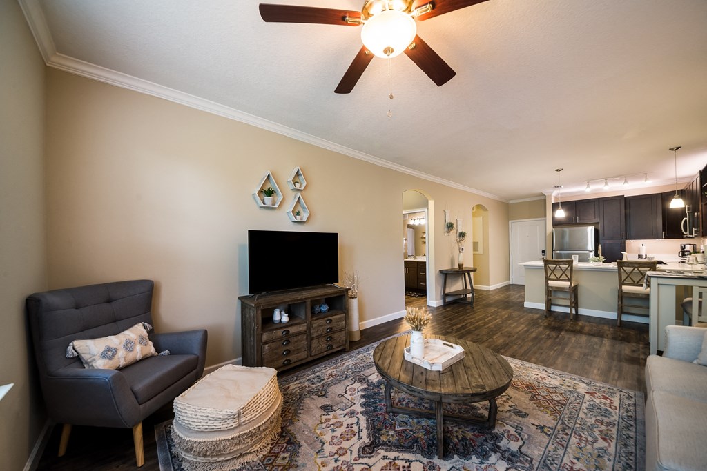 a living room with a couch and a table at The Oasis at Highwoods Preserve, Tampa, 33647