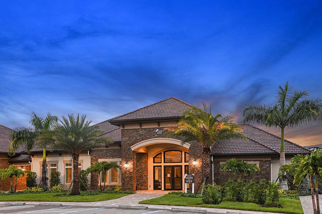 Clubhouse Twilight View at The Oasis at Cypress Woods, Florida