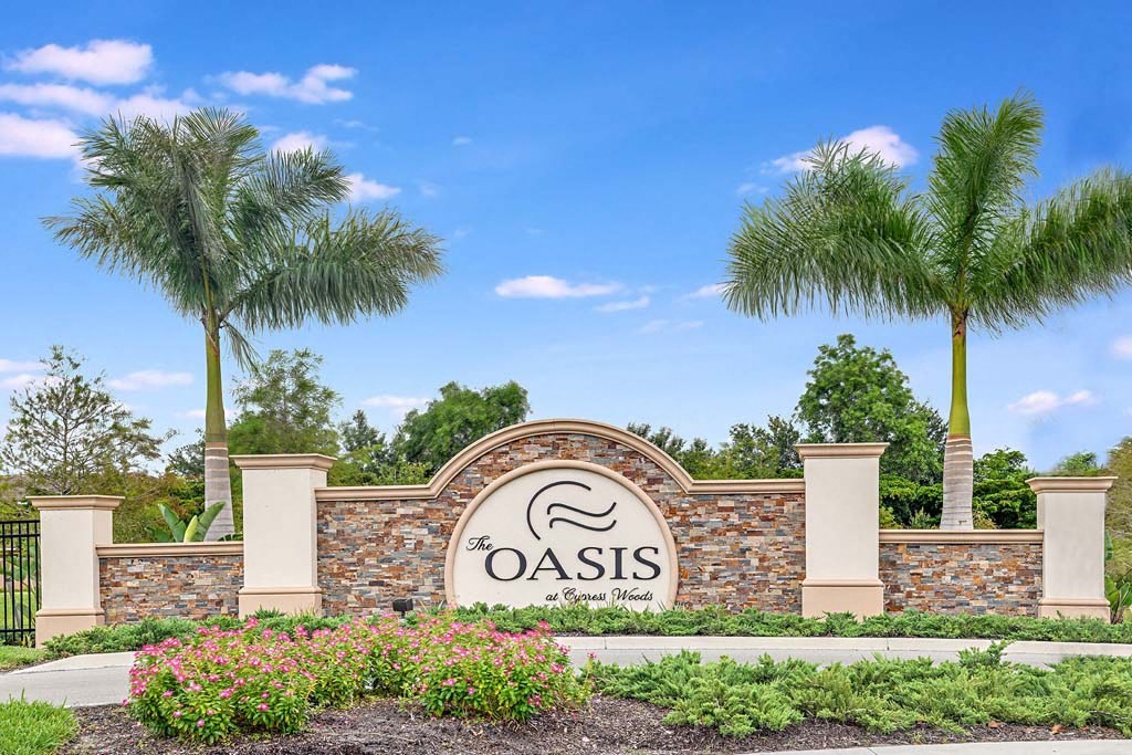 Entrance Sign at The Oasis at Cypress Woods, Florida, 33966