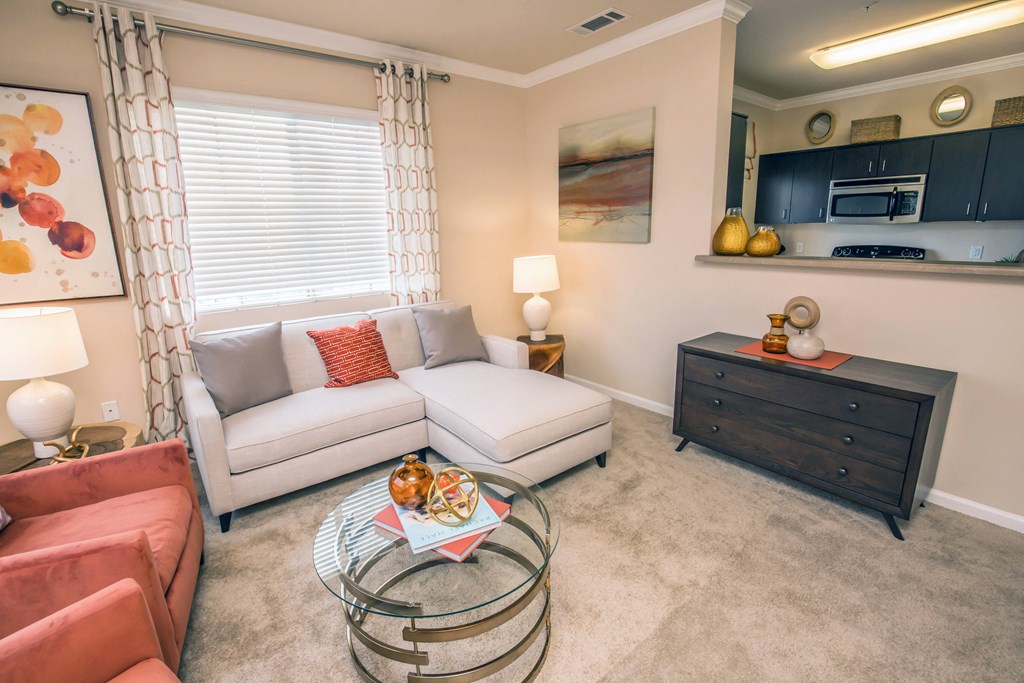 a living room with a couch and a table