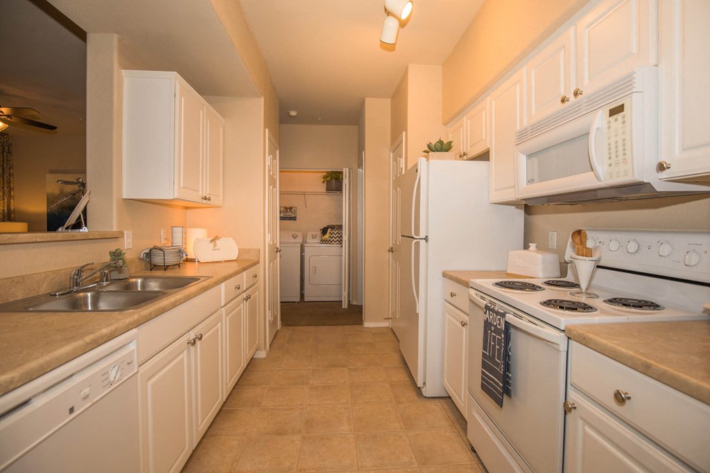 Kitchen space with appliances at The Aliante by Picerne, Scottsdale