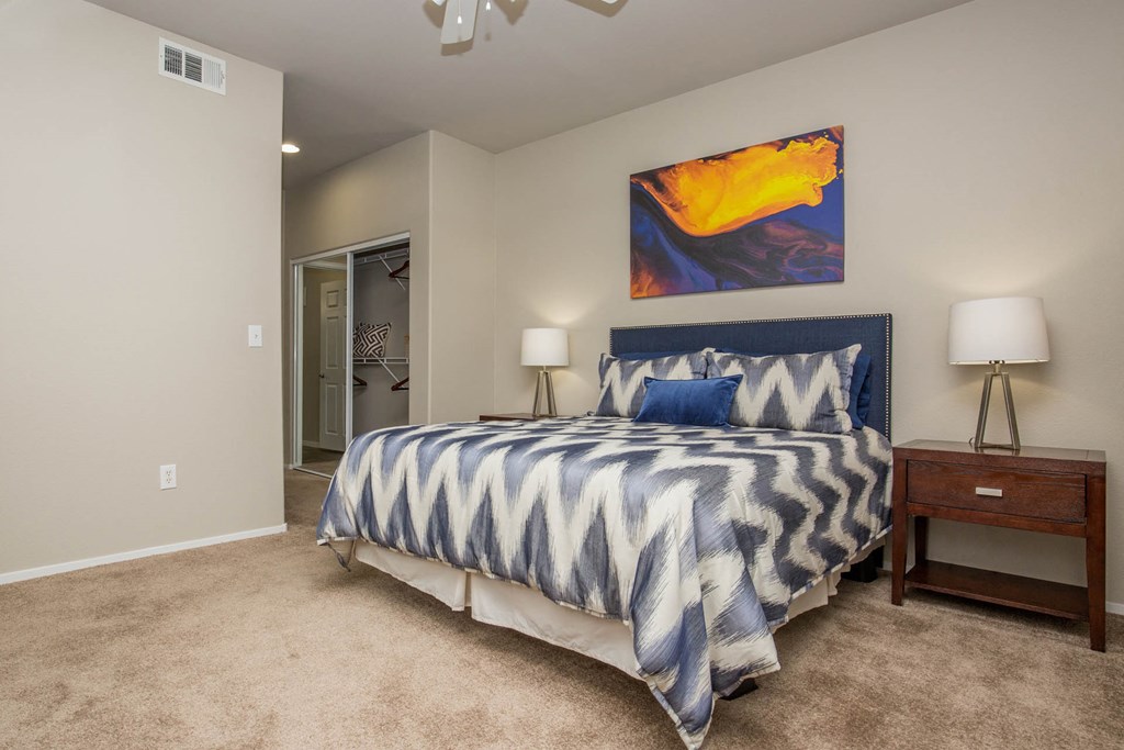 Bedroom with cozy bed and frame at The Belmont by Picerne, Las Vegas, 89183