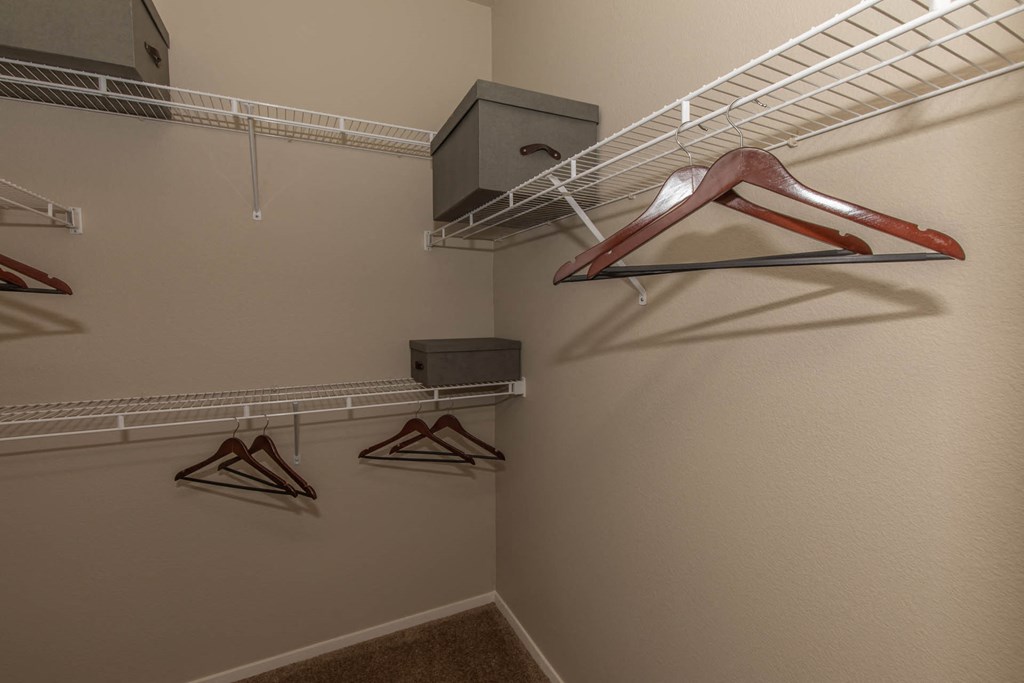 Closet space with hangers at The Belmont by Picerne, Nevada