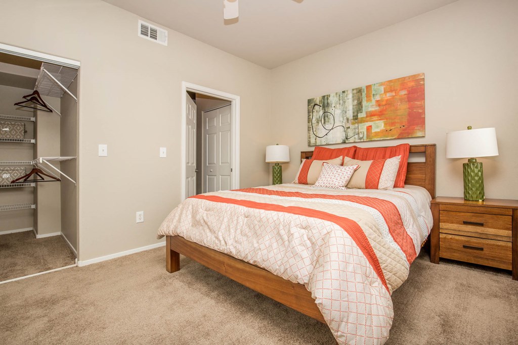 Bed and lamps at The Belmont by Picerne, Las Vegas