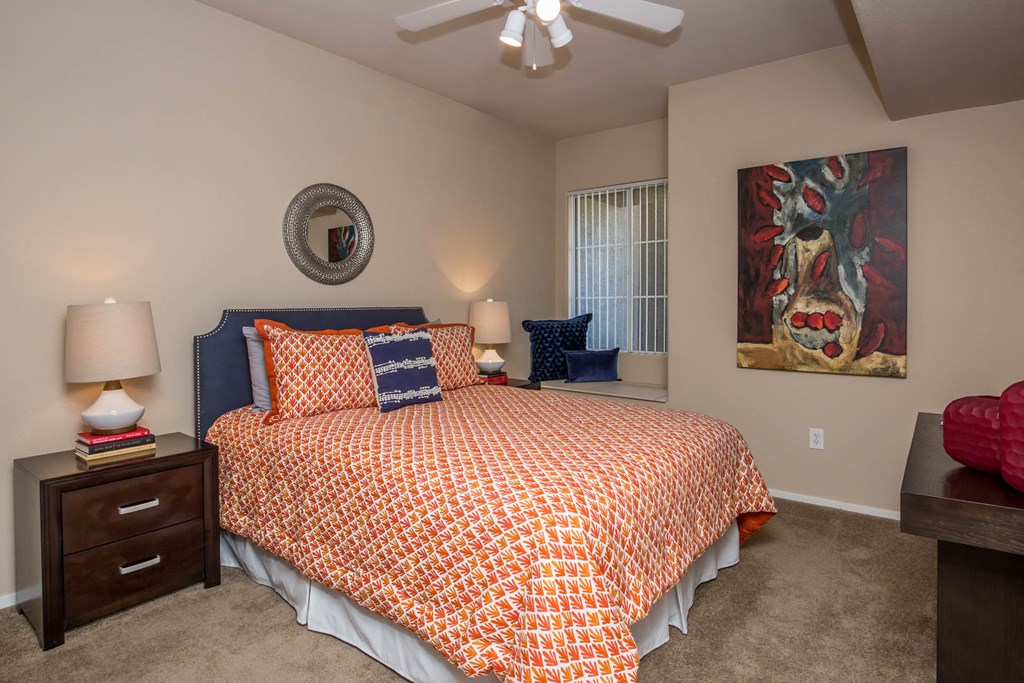 Bedroom with cozy bed and ceiling fan and lights at The Belmont by Picerne, Nevada