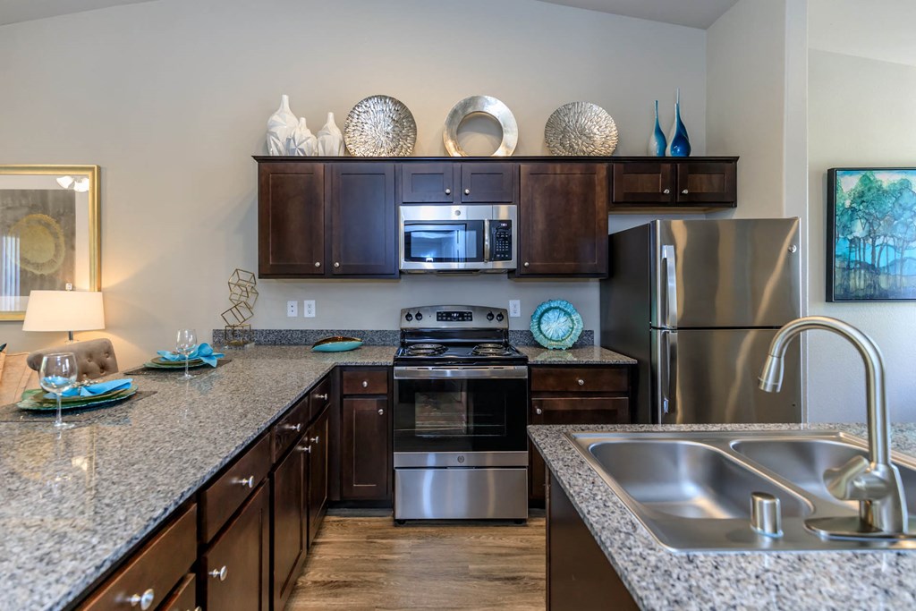 Kitchen wide view with cabinets at The Cantera by Picerne, Nevada