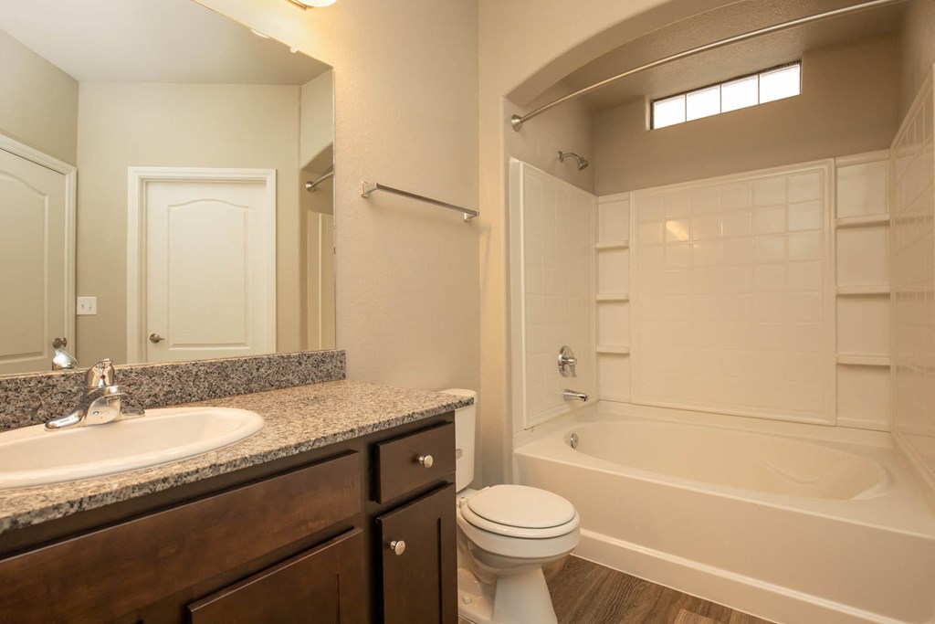 Bathroom area with wooden cabinet at The Cantera by Picerne, Nevada, 89139