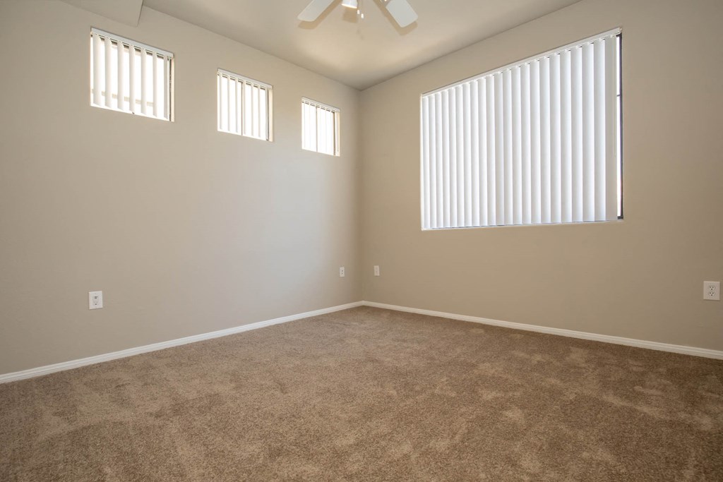 Unfurnished room with wooden floor and ceiling fan1 at The Cantera by Picerne, Las Vegas