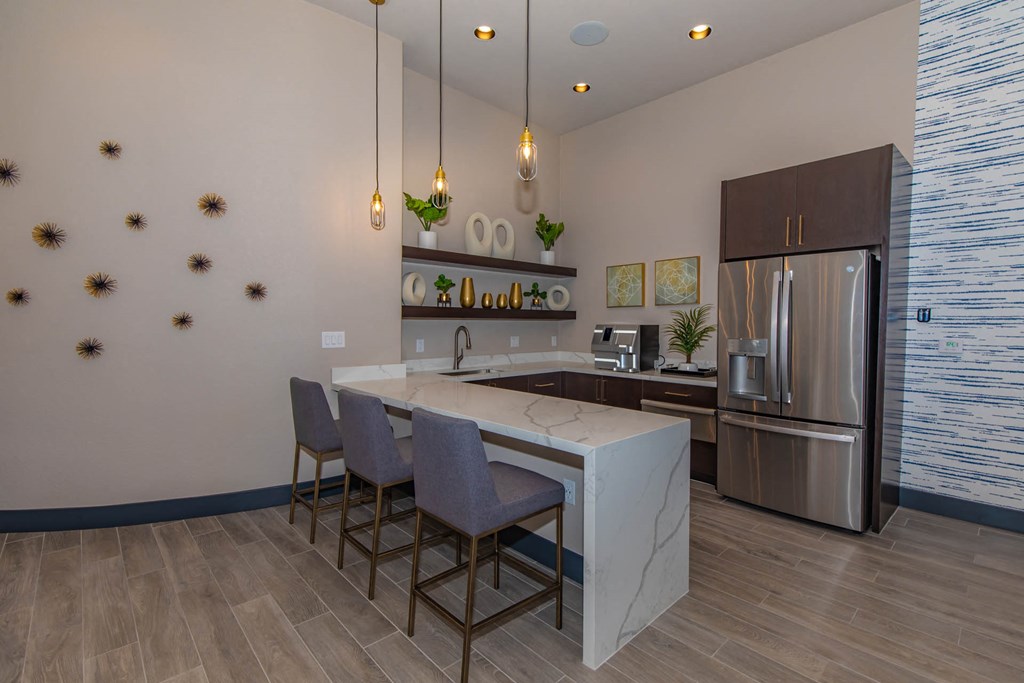 Kitchen breakfast bar at The Covington by Picerne, Las Vegas, 89139