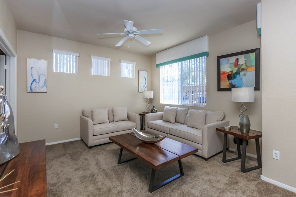 Sofa and window view at The Covington by Picerne, Las Vegas, Nevada