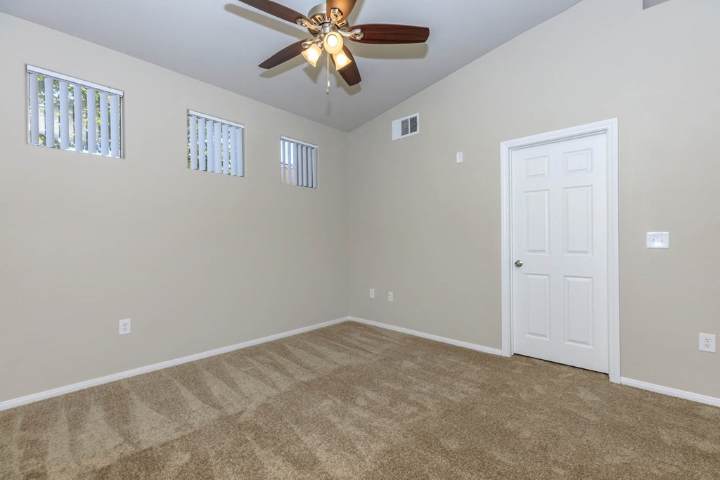 Room with ceiling fan and light at The Covington by Picerne, Las Vegas, NV