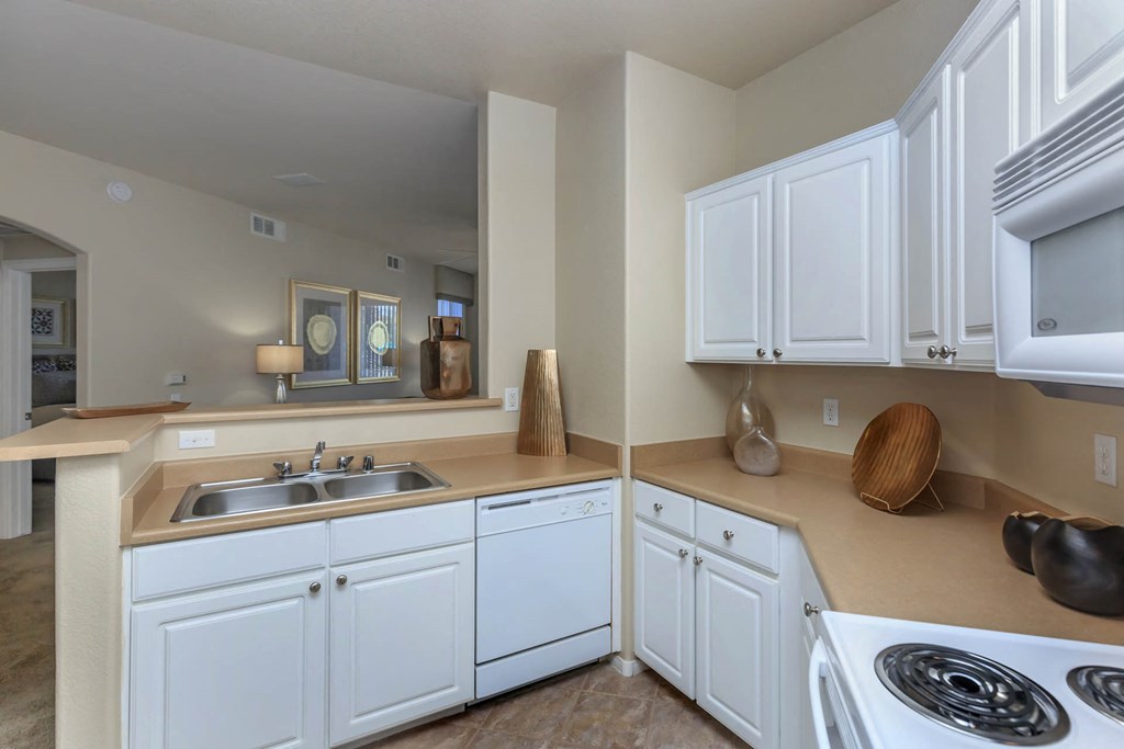 White kitchen interior at The Covington by Picerne, Nevada, 89139
