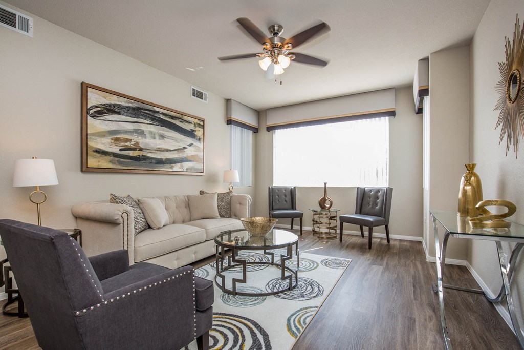 Living room with frame and lamps at The Fairways by Picerne, Las Vegas, Nevada