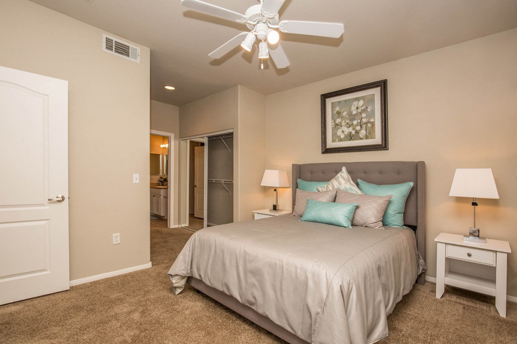 Bedroom with ceiling fan and light at The Fairways by Picerne, Las Vegas