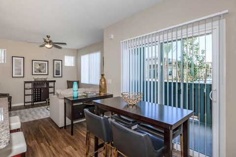 Wooden cabinets in kitchen and dining at Level 25 at Durango by Picerne, Las Vegas, NV, 89113