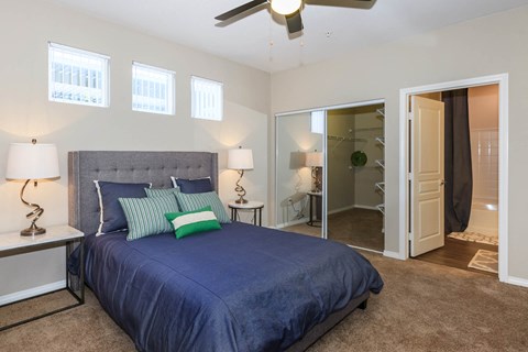 Bedroom with bed and lamps at Level 25 at Durango by Picerne, Las Vegas, NV, 89113