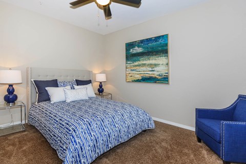 Bed and lamps with frames at Level 25 at Durango by Picerne, Las Vegas, NV