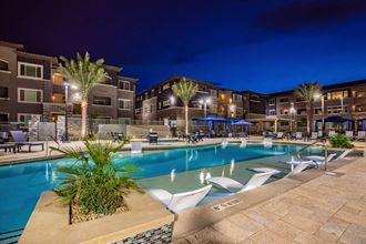 Night pool view at Level 25 at Sunset by Picerne, Las Vegas, NV, 89113 - Photo Gallery 5