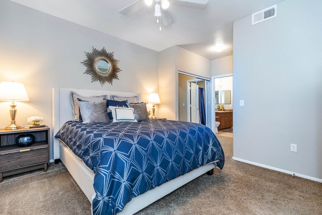 Bedroom with lights and bed at The Paseo by Picerne, Goodyear