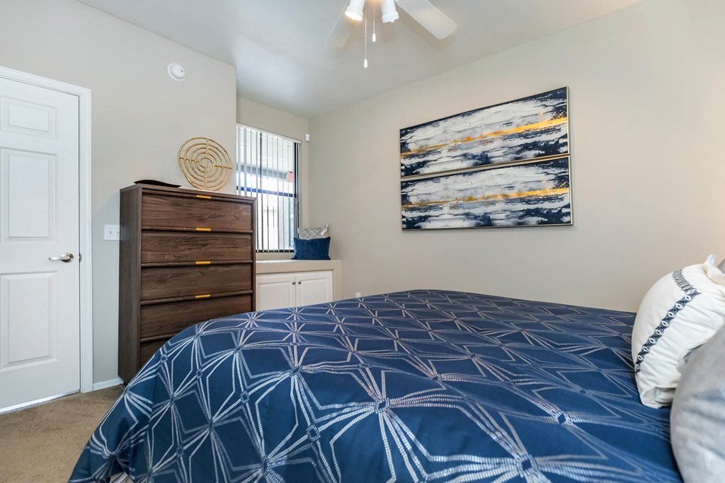 Bed in bedroom at The Paseo by Picerne, Arizona