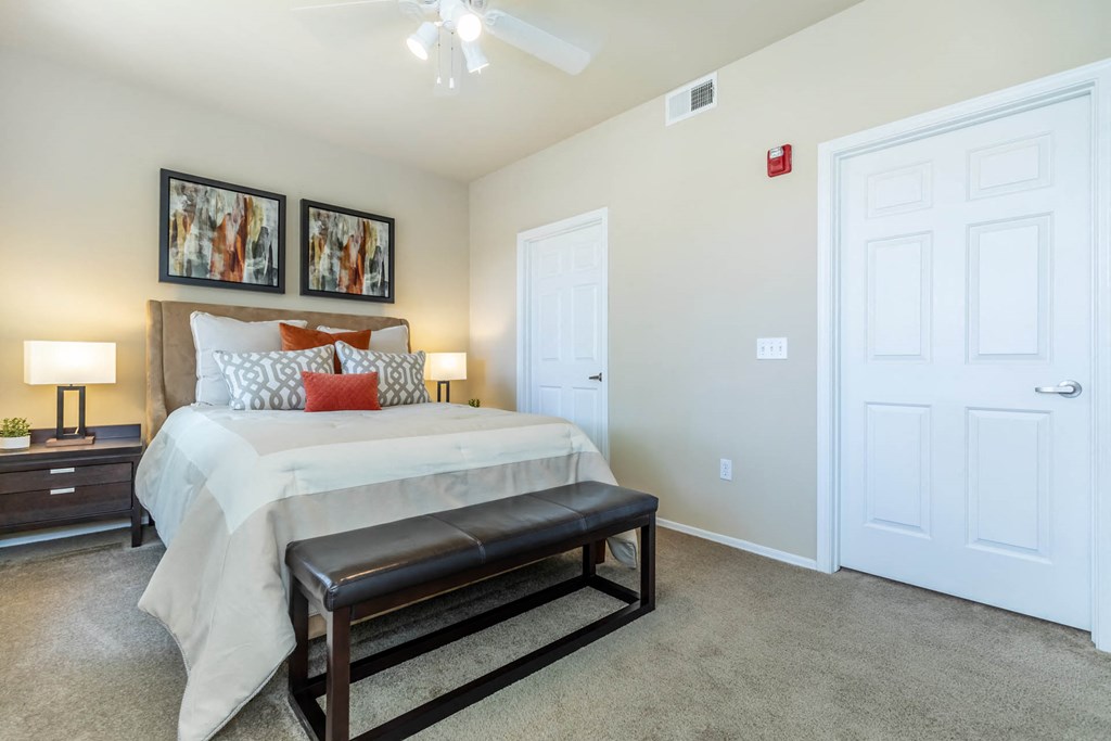 Bedroom with lamps at The Paseo by Picerne, Goodyear, Arizona