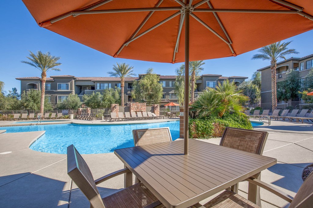 Poolside Dining Table at The Passage Apartments by Picerne, Henderson, NV