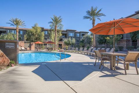 Pool Side Relaxing Area With Sundeck at The Passage Apartments by Picerne, Henderson, NV, 89014