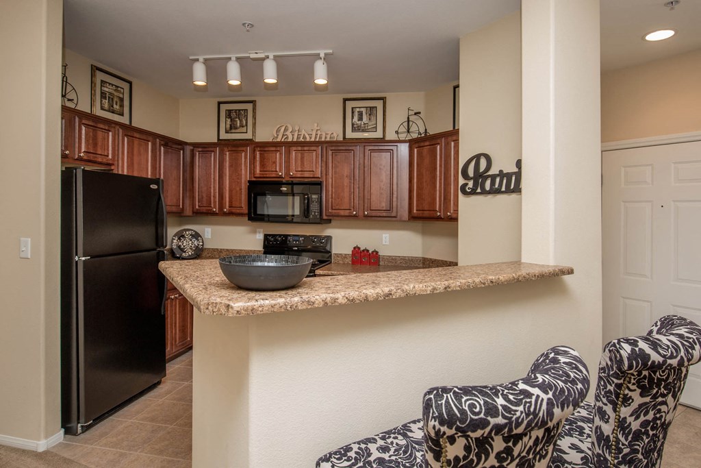 Spacious Kitchen With Pantry Cabinet at The Passage Apartments by Picerne, Henderson, Nevada
