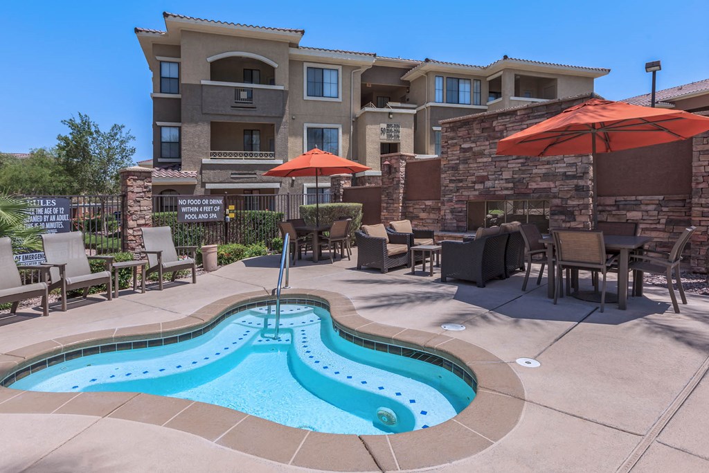 Swimming Pool Area With Shaded Chairs at The Presidio by Picerne, N Las Vegas, NV, 89084