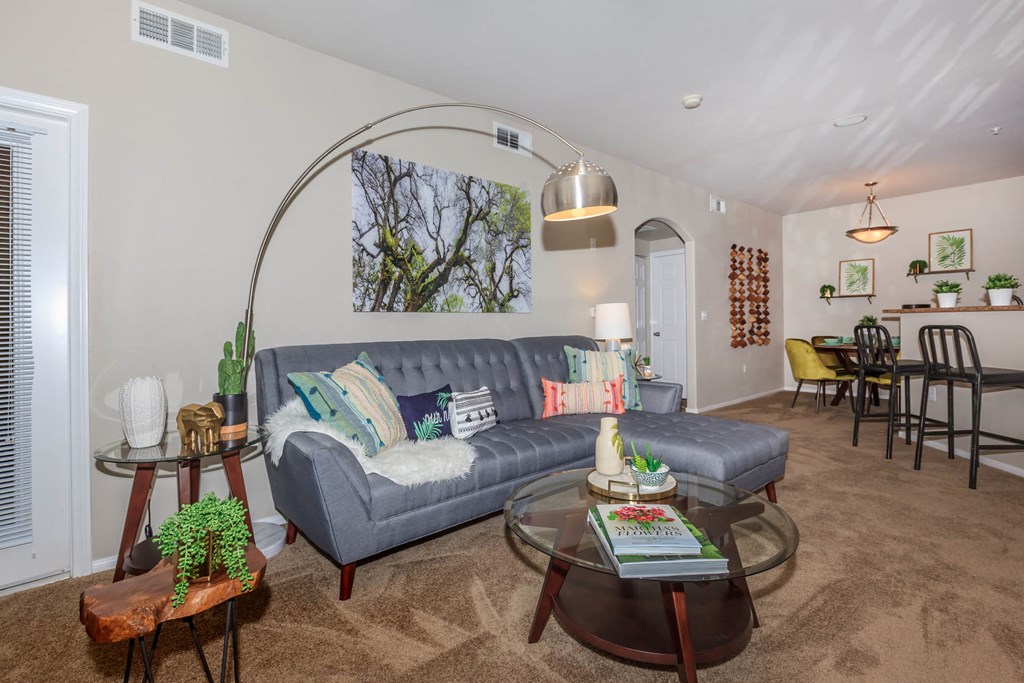 Living Room With Kitchen View at The Presidio by Picerne, N Las Vegas