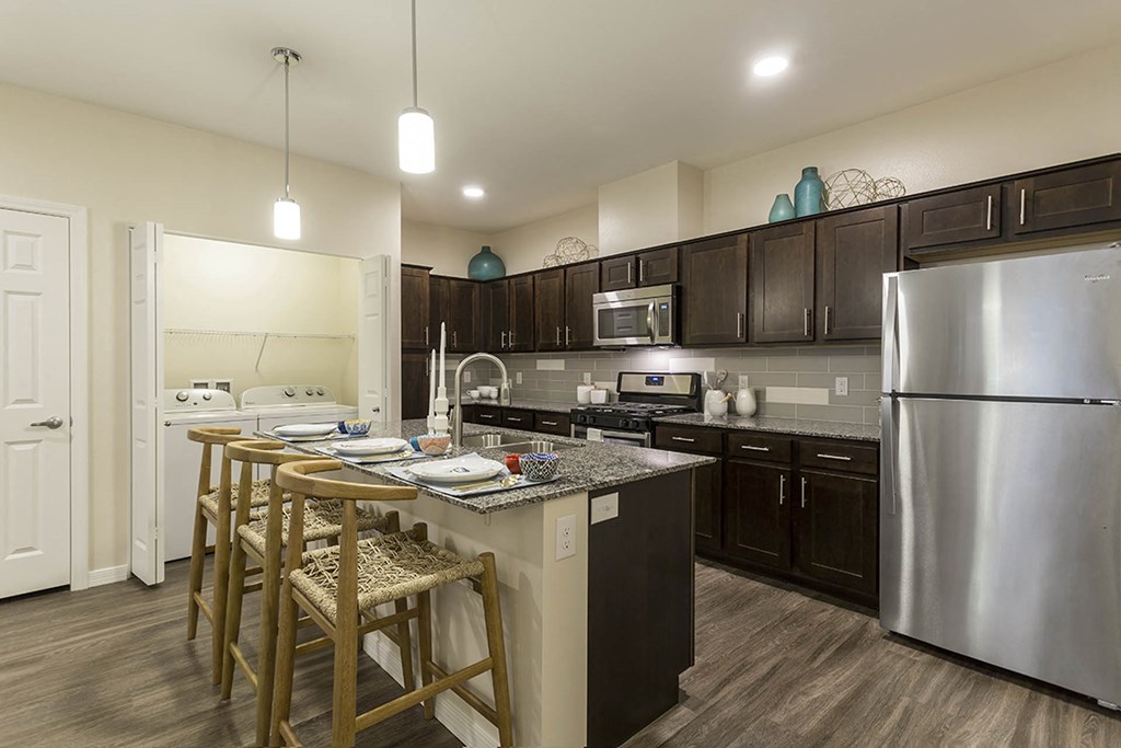 Kitchen with wooden cabinets at The View at Horizon Ridge, Nevada