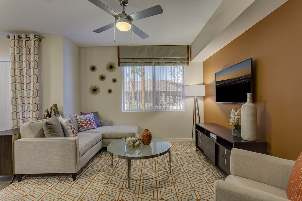 Living with couch and center table , ceiling fan and light at The View at Horizon Ridge, Nevada
