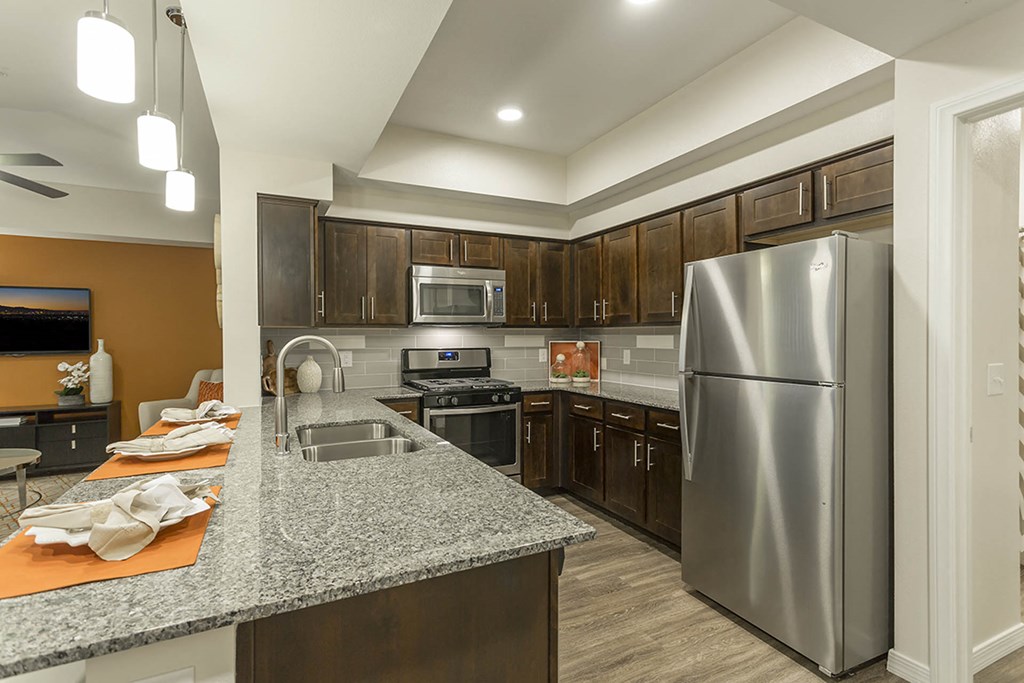 Kitchen with appliances , wooden cabinets and wooden floor at The View at Horizon Ridge, Nevada, 89012