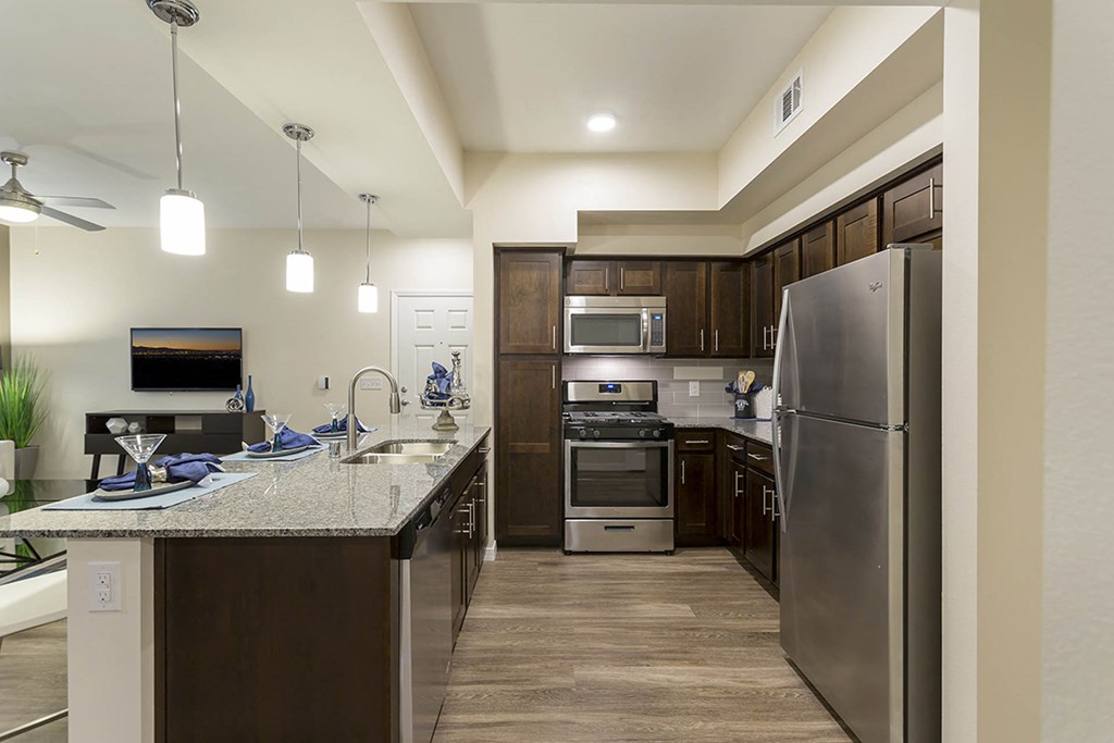 Wooden cabinets in kitchen and appliances at The View at Horizon Ridge, Henderson, 89012