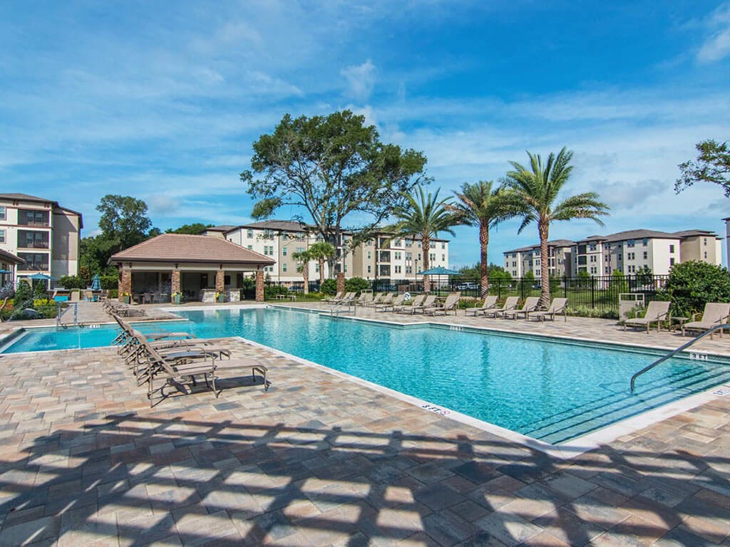 Swimming Pool With Relaxing Sundecks Swimming Pool With Relaxing Sundecks at The Oasis at Lake Bennet, Ocoee, Florida