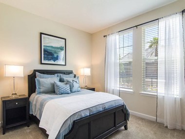 Bedroom With Expansive Windows at The Oasis at Manatee River, Florida