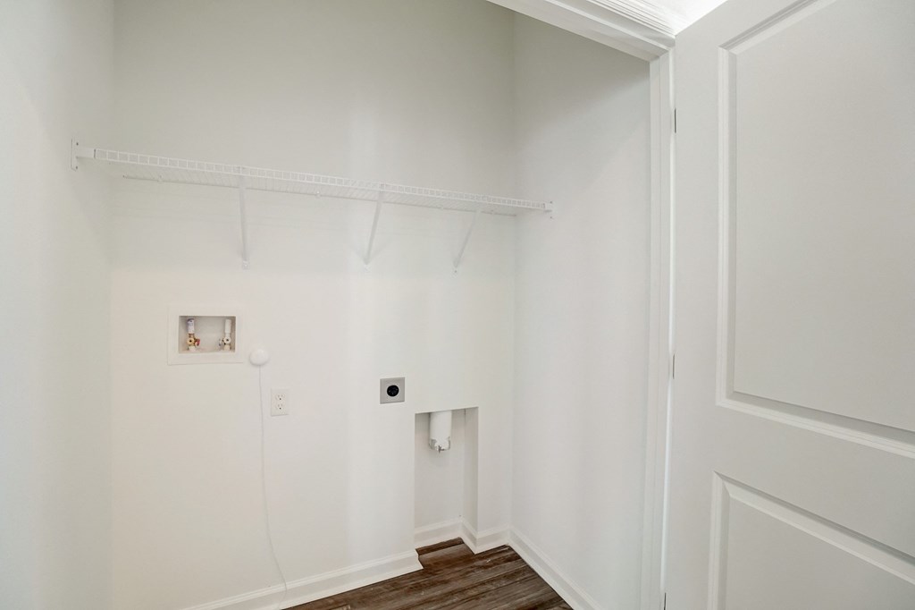 Elm floor plan laundry room with full size washer and dryer connection at Beacon at Clinton Corners in Dade City, FL