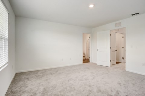 Spacious and empty master bedroom at Beacon at Arbours in Ruskin, FL