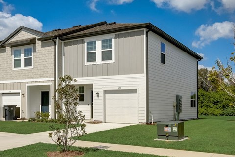 Inviting front exterior of Beacon at Arbours single family rental house in Ruskin, FL