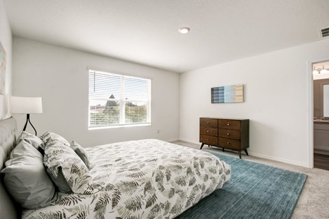 Sophisticated and fully furnished model master bedroom at Beacon at Arbours in Ruskin, FL